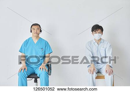 Japanese doctor and patient View Large Photo Image Stock Image - Japanese doctor and patient. Fotosearch