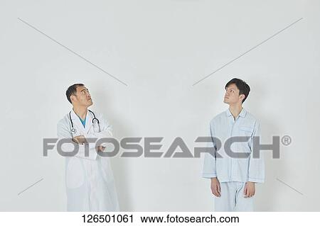 Japanese doctor and patient View Large Photo Image Stock Image - Japanese doctor and patient. Fotosearch