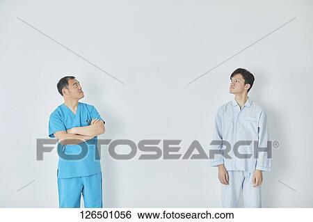 Japanese doctor and patient View Large Photo Image Stock Photograph - Japanese doctor and patient. Fotosearch