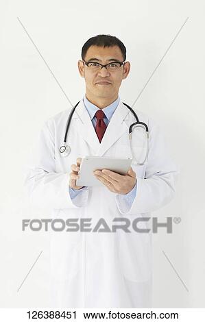 Japanese doctor in the studio View Large Photo Image Stock Image - Japanese doctor in the studio. Fotosearch