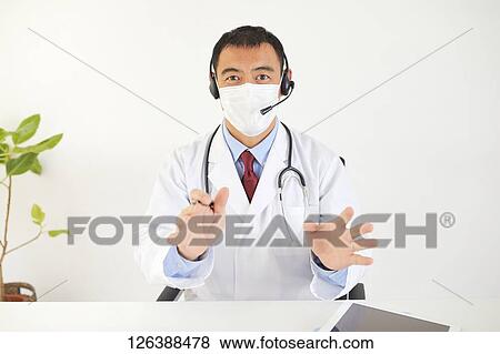 Japanese doctor in the studio View Large Photo Image Stock Photo - Japanese doctor in the studio. Fotosearch