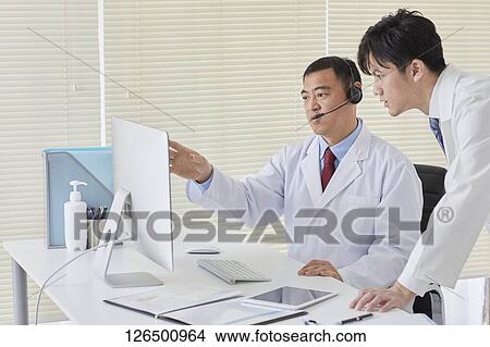 Japanese doctors in the studio View Large Photo Image Picture - Japanese doctors in the studio. Fotosearch