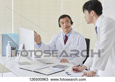 Japanese doctors in the studio View Large Photo Image Stock Image - Japanese doctors in the studio. Fotosearch