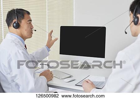 Japanese doctors in the studio View Large Photo Image Stock Image - Japanese doctors in the studio. Fotosearch