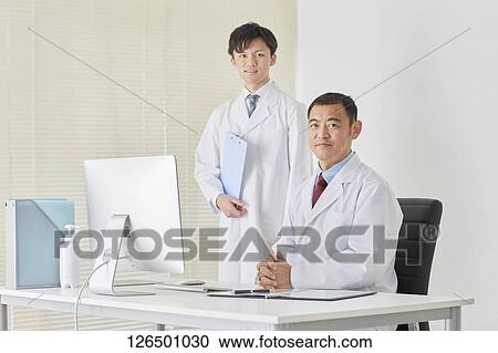 Japanese doctors in the studio View Large Photo Image Stock Image - Japanese doctors in the studio. Fotosearch