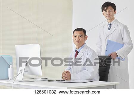 Japanese doctors in the studio View Large Photo Image Stock Image - Japanese doctors in the studio. Fotosearch