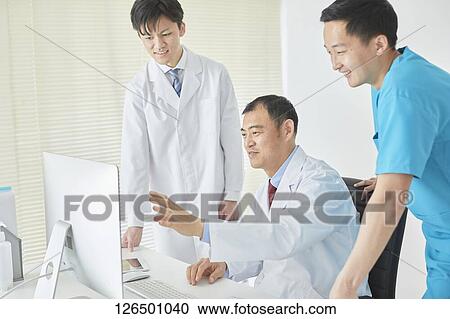 Japanese doctors in the studio View Large Photo Image Stock Image - Japanese doctors in the studio. Fotosearch