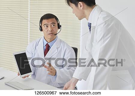 Japanese doctors in the studio View Large Photo Image Stock Photo - Japanese doctors in the studio. Fotosearch