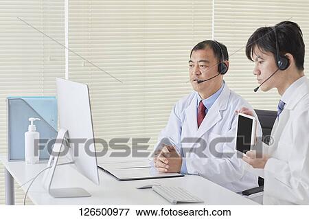 Japanese doctors in the studio View Large Photo Image Stock Photo - Japanese doctors in the studio. Fotosearch