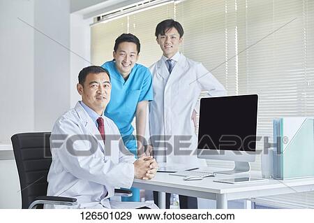 Japanese doctors in the studio View Large Photo Image Stock Photo - Japanese doctors in the studio. Fotosearch