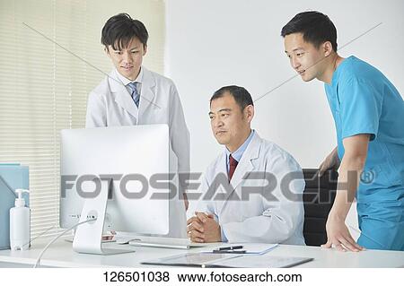 Japanese doctors in the studio View Large Photo Image Stock Photo - Japanese doctors in the studio. Fotosearch