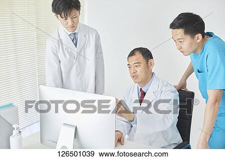 Japanese doctors in the studio View Large Photo Image Stock Photo - Japanese doctors in the studio. Fotosearch