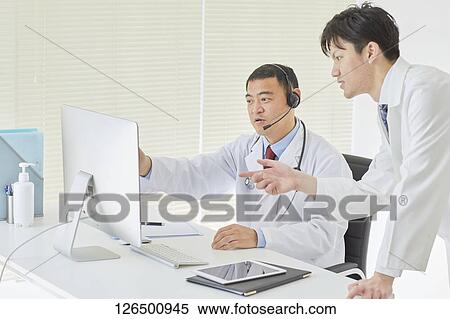 Japanese doctors in the studio View Large Photo Image Stock Photography - Japanese doctors in the studio. Fotosearch