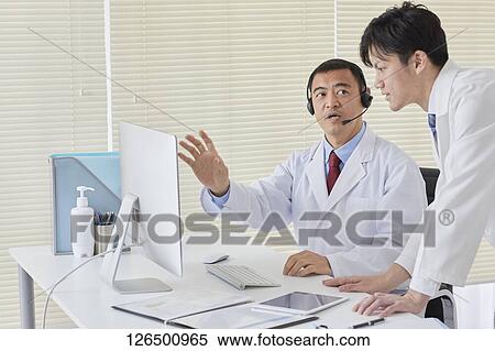 Japanese doctors in the studio View Large Photo Image Stock Photography - Japanese doctors in the studio. Fotosearch