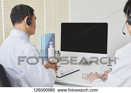 Japanese doctors in the studio View Large Photo Image Stock Photography - Japanese doctors in the studio. Fotosearch
