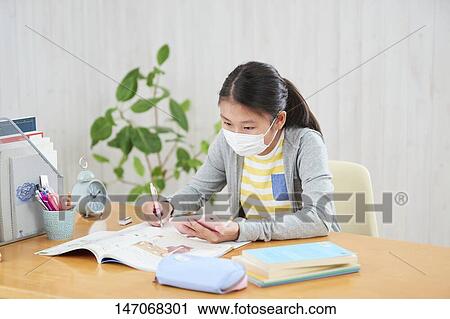 Japanese junior high schoolgirl studying remotely View Large Photo Image Stock Image - Japanese junior high schoolgirl studying remotely. Fotosearch