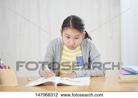 Japanese junior high schoolgirl studying remotely View Large Photo Image Stock Image - Japanese junior high schoolgirl studying remotely. Fotosearch