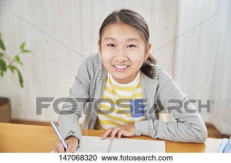 Japanese junior high schoolgirl studying remotely View Large Photo Image Stock Image - Japanese junior high schoolgirl studying remotely. Fotosearch