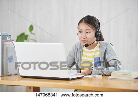 Japanese junior high schoolgirl studying remotely View Large Photo Image Stock Image - Japanese junior high schoolgirl studying remotely. Fotosearch