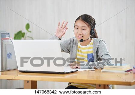 Japanese junior high schoolgirl studying remotely View Large Photo Image Stock Image - Japanese junior high schoolgirl studying remotely. Fotosearch