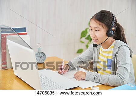 Japanese junior high schoolgirl studying remotely View Large Photo Image Stock Image - Japanese junior high schoolgirl studying remotely. Fotosearch
