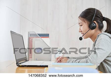 Japanese junior high schoolgirl studying remotely View Large Photo Image Stock Image - Japanese junior high schoolgirl studying remotely. Fotosearch