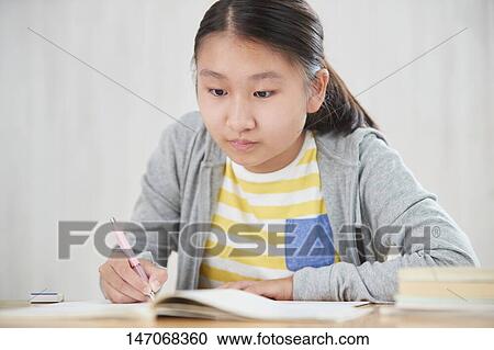 Japanese junior high schoolgirl studying remotely View Large Photo Image Stock Image - Japanese junior high schoolgirl studying remotely. Fotosearch