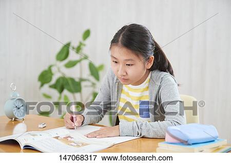 Japanese junior high schoolgirl studying remotely View Large Photo Image Stock Photo - Japanese junior high schoolgirl studying remotely. Fotosearch