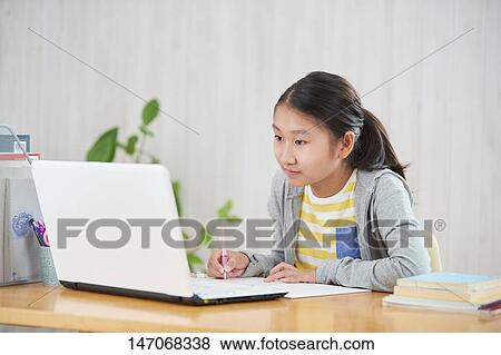 Japanese junior high schoolgirl studying remotely View Large Photo Image Stock Photo - Japanese junior high schoolgirl studying remotely. Fotosearch