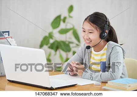 Japanese junior high schoolgirl studying remotely View Large Photo Image Stock Photo - Japanese junior high schoolgirl studying remotely. Fotosearch