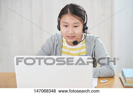 Japanese junior high schoolgirl studying remotely View Large Photo Image Stock Photo - Japanese junior high schoolgirl studying remotely. Fotosearch
