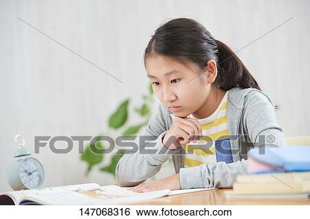 Japanese junior high schoolgirl studying remotely View Large Photo Image Stock Photograph - Japanese junior high schoolgirl studying remotely. Fotosearch