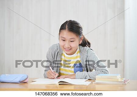 Japanese junior high schoolgirl studying remotely View Large Photo Image Stock Photograph - Japanese junior high schoolgirl studying remotely. Fotosearch
