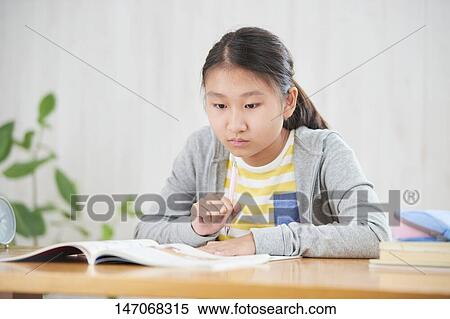 Japanese junior high schoolgirl studying remotely View Large Photo Image Stock Photography - Japanese junior high schoolgirl studying remotely. Fotosearch