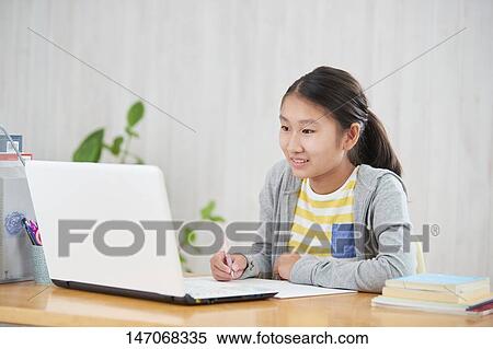 Japanese junior high schoolgirl studying remotely View Large Photo Image Stock Photography - Japanese junior high schoolgirl studying remotely. Fotosearch