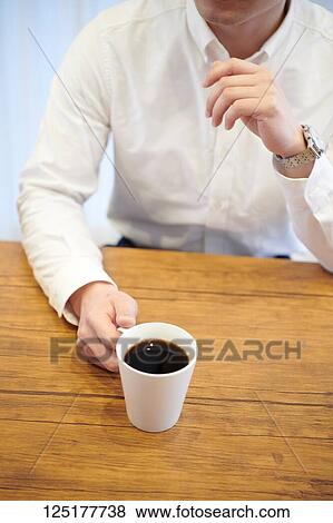 Stock Photo - Japanese man at home. Fotosearch