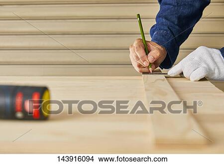 Japanese man doing DIY View Large Photo Image Picture - Japanese man doing DIY. Fotosearch