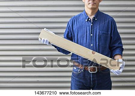 Japanese man doing DIY View Large Photo Image Stock Image - Japanese man doing DIY. Fotosearch