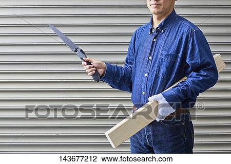Japanese man doing DIY View Large Photo Image Stock Image - Japanese man doing DIY. Fotosearch