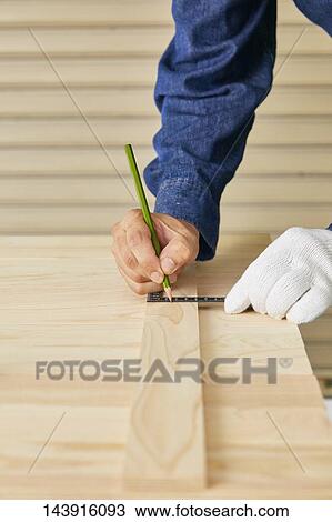 Japanese man doing DIY View Large Photo Image Stock Image - Japanese man doing DIY. Fotosearch