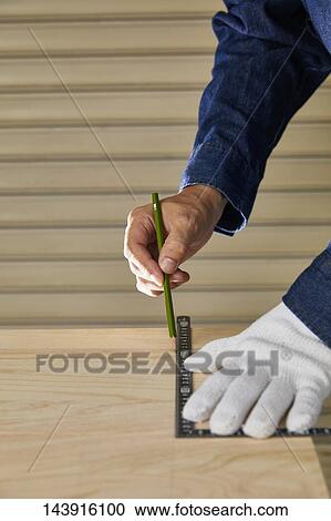 Japanese man doing DIY View Large Photo Image Stock Image - Japanese man doing DIY. Fotosearch