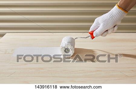 Japanese man doing DIY View Large Photo Image Stock Photo - Japanese man doing DIY. Fotosearch
