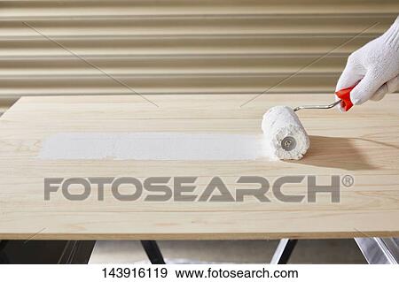 Japanese man doing DIY View Large Photo Image Stock Photo - Japanese man doing DIY. Fotosearch