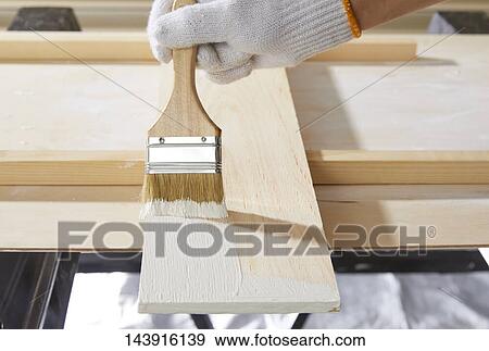 Japanese man doing DIY View Large Photo Image Stock Photo - Japanese man doing DIY. Fotosearch