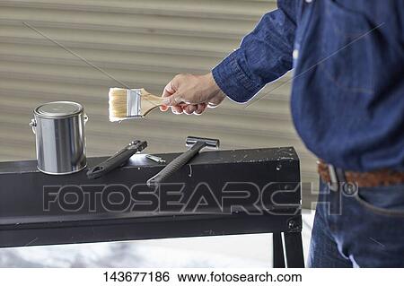 Japanese man doing DIY View Large Photo Image Stock Photograph - Japanese man doing DIY. Fotosearch