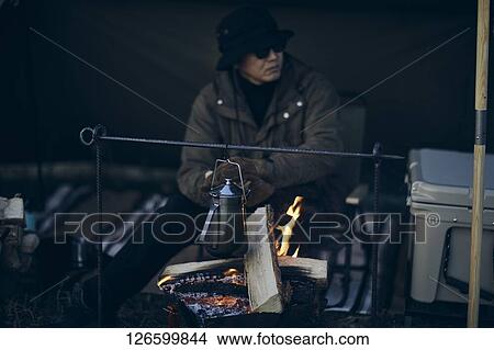 Japanese man solo camping View Large Photo Image Picture - Japanese man solo camping. Fotosearch