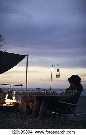Japanese man solo camping View Large Photo Image Picture - Japanese man solo camping. Fotosearch