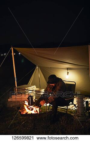 Japanese man solo camping View Large Photo Image Stock Image - Japanese man solo camping. Fotosearch