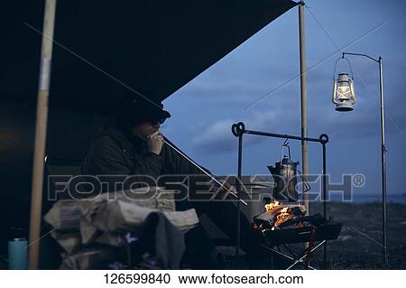 Japanese man solo camping View Large Photo Image Stock Image - Japanese man solo camping. Fotosearch