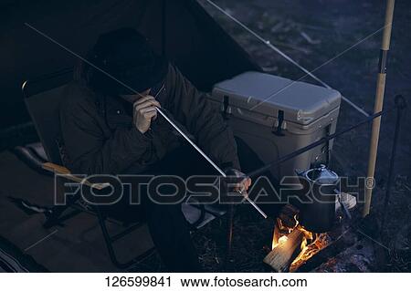 Japanese man solo camping View Large Photo Image Stock Image - Japanese man solo camping. Fotosearch
